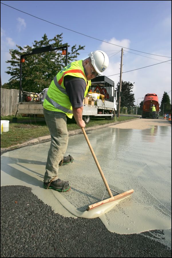 Applying an Anti-skid Road Surface: Swipe To View More Images